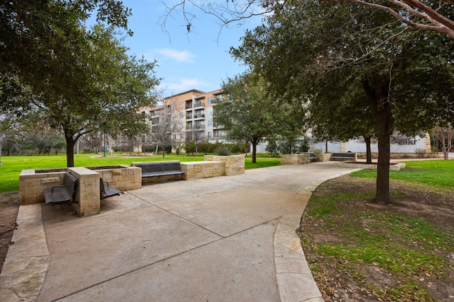 surrounding community featuring a lawn