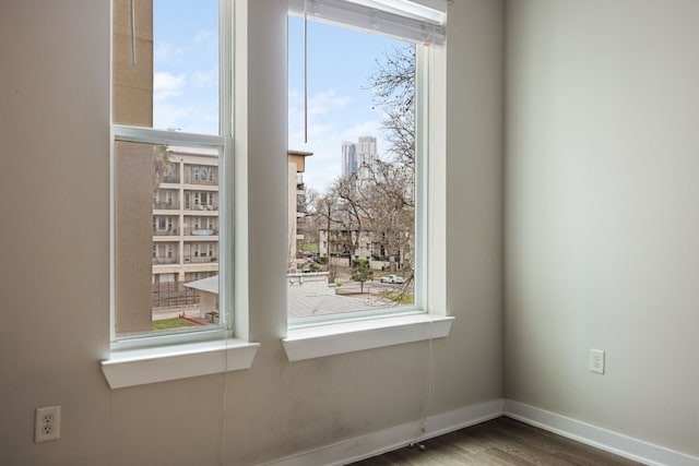 empty room featuring hardwood / wood-style floors