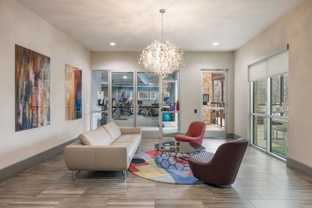 living room with a notable chandelier