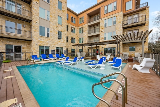 view of pool with a pergola