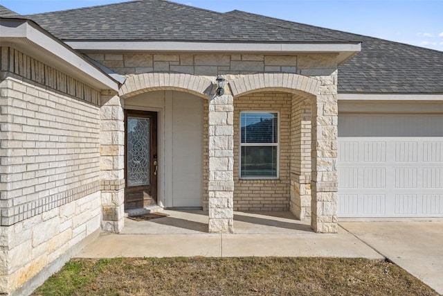 entrance to property with a garage