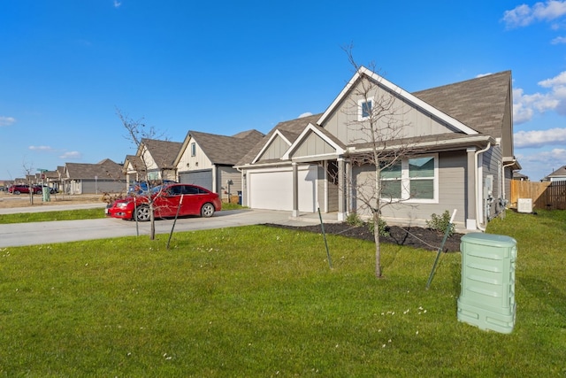 view of front facade featuring a garage and a front yard