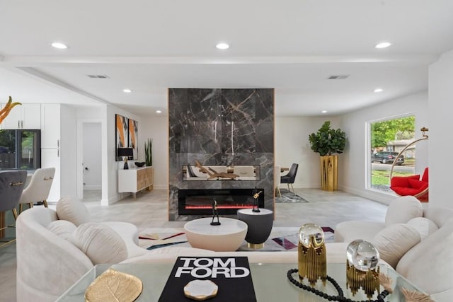 living room featuring a fireplace