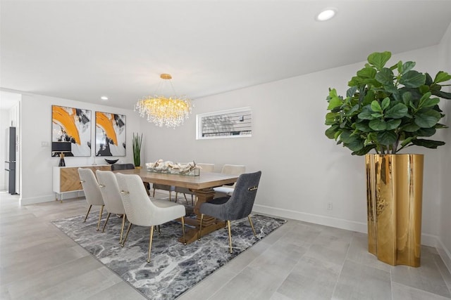 dining area featuring a chandelier