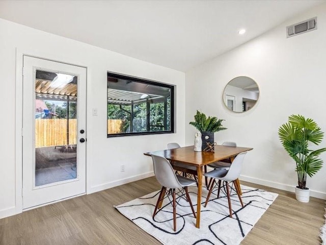 dining room featuring light hardwood / wood-style flooring