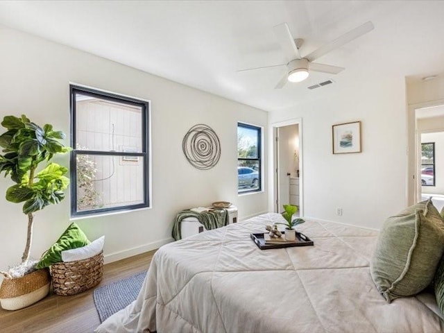 bedroom featuring ceiling fan and light wood-type flooring