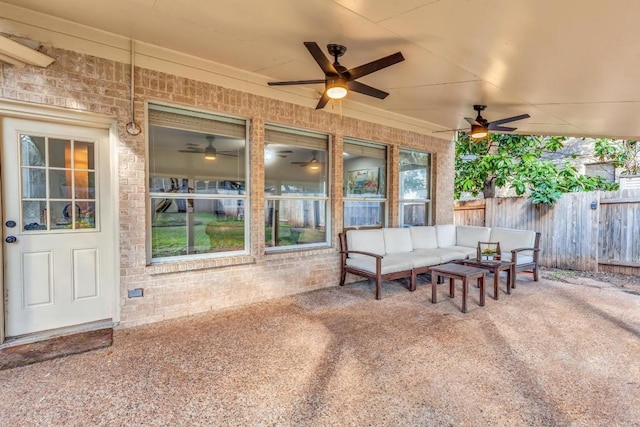 view of patio with ceiling fan, outdoor lounge area, and fence