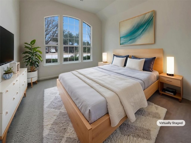 bedroom with vaulted ceiling