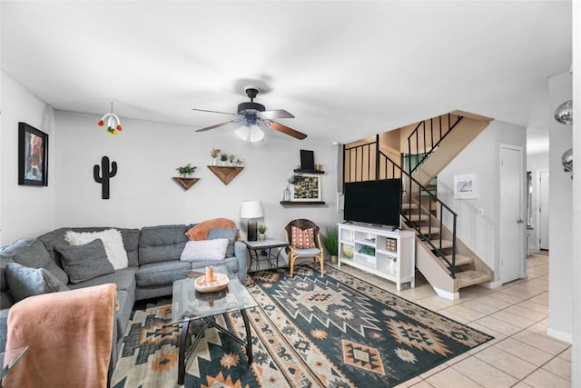 tiled living room with ceiling fan