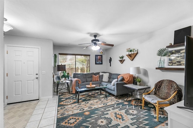 tiled living room with ceiling fan