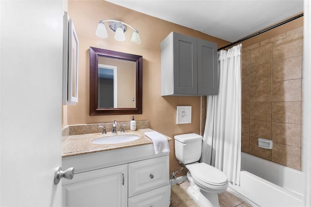 full bathroom featuring tile patterned flooring, vanity, shower / bath combo with shower curtain, and toilet