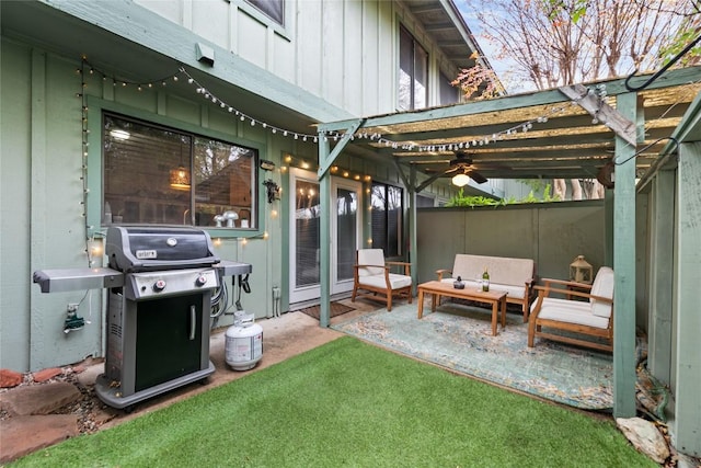 view of patio / terrace with a grill, a pergola, and an outdoor living space