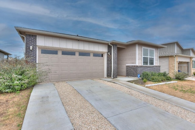 ranch-style home featuring a garage