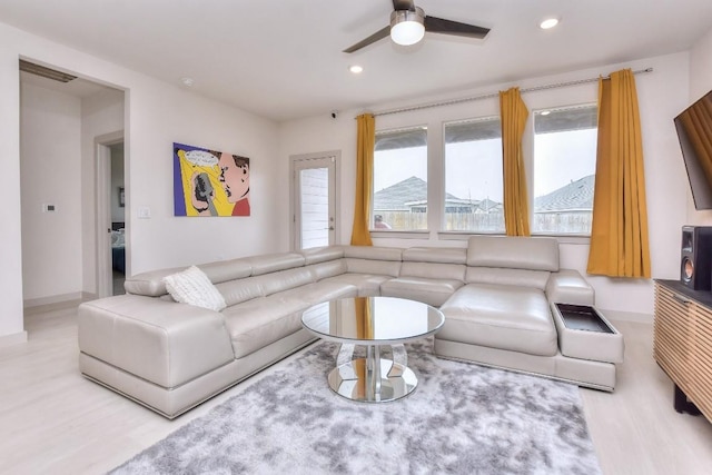 living room featuring wood finished floors, recessed lighting, and ceiling fan