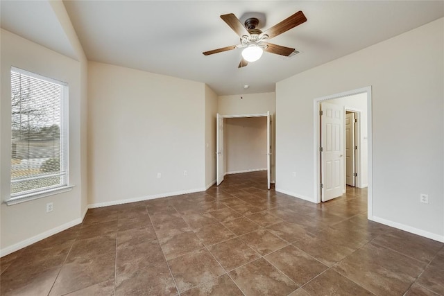 unfurnished bedroom with ceiling fan