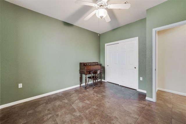 unfurnished bedroom with a closet and ceiling fan