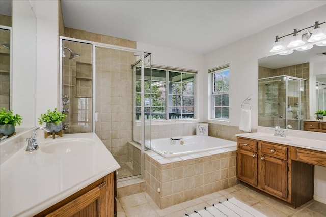 bathroom with vanity, tile patterned flooring, and plus walk in shower