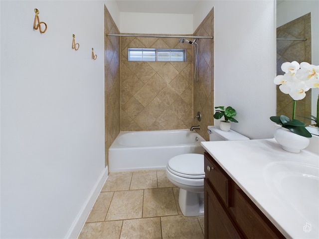 full bathroom featuring vanity, tiled shower / bath combo, and toilet