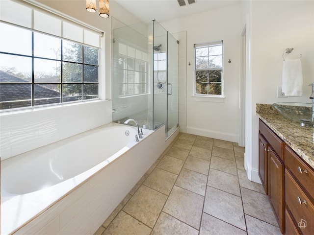 bathroom featuring vanity and separate shower and tub