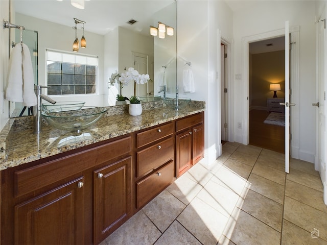 bathroom featuring vanity and tile patterned floors