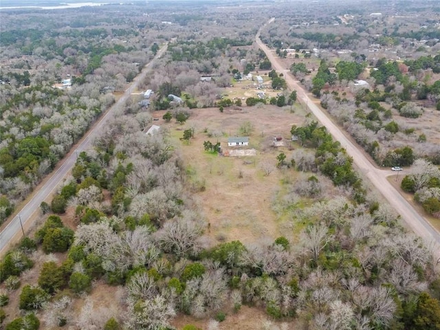 birds eye view of property featuring a rural view