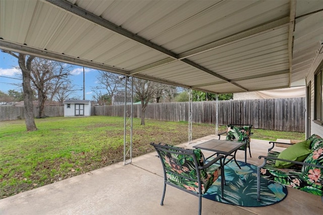 view of patio with a shed