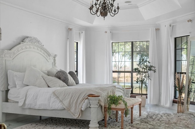 bedroom featuring multiple windows, a raised ceiling, and crown molding