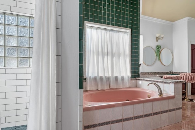 bathroom featuring ornamental molding, separate shower and tub, sink, and tile patterned floors