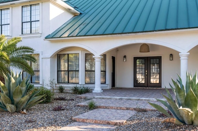 doorway to property featuring french doors