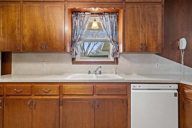 kitchen with sink and dishwasher