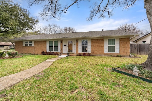 ranch-style house with a front lawn