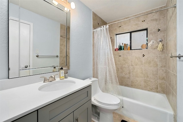 full bathroom featuring vanity, shower / tub combo with curtain, and toilet