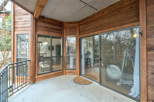 unfurnished sunroom with a healthy amount of sunlight