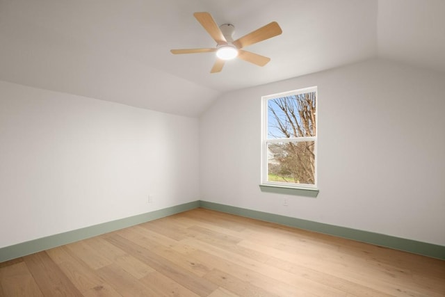 bonus room featuring ceiling fan, lofted ceiling, and hardwood / wood-style floors