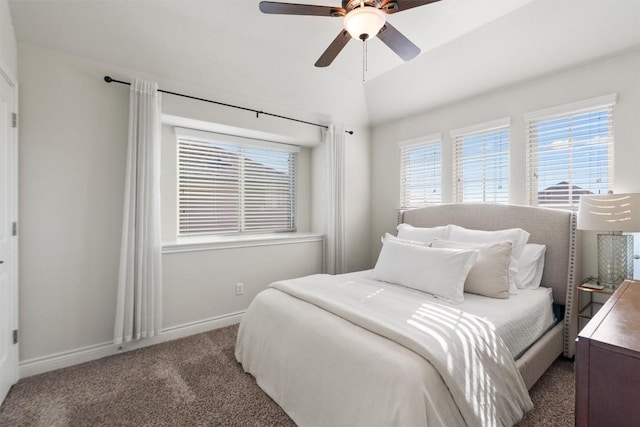 bedroom with lofted ceiling, carpet floors, and ceiling fan