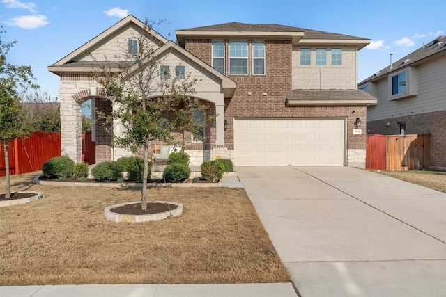 view of front of property with a garage