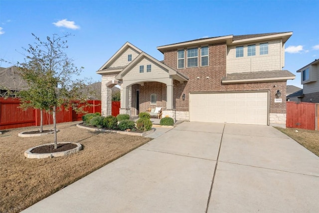 view of front of house with a garage and covered porch