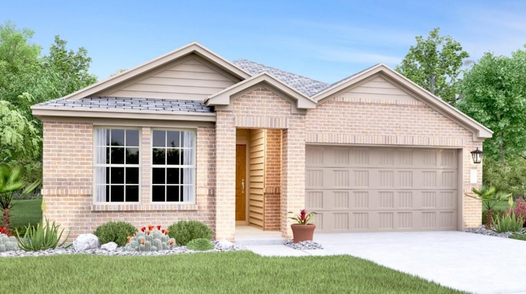 view of front of home with a garage