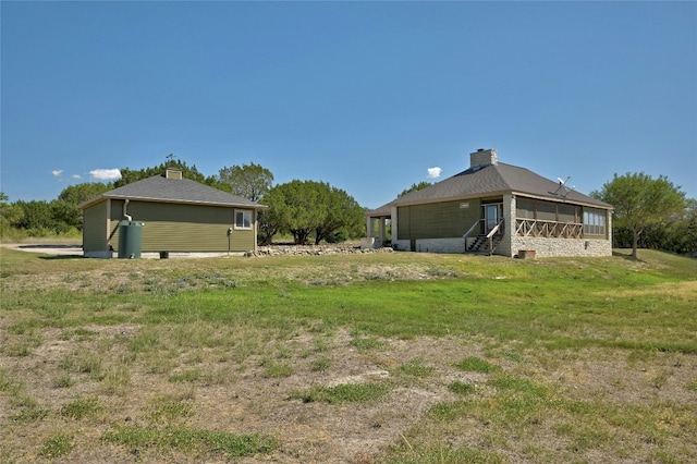 view of yard featuring entry steps