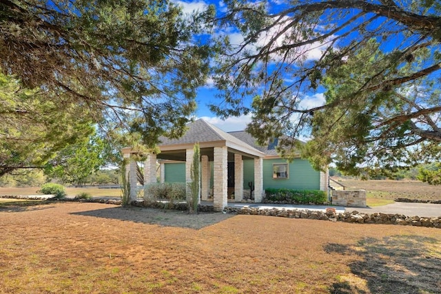 view of front of property featuring stone siding