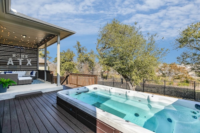 wooden deck featuring an outdoor hangout area