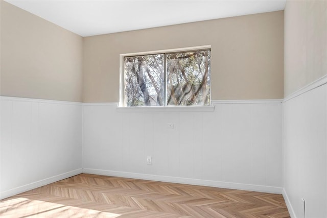 empty room featuring light parquet flooring