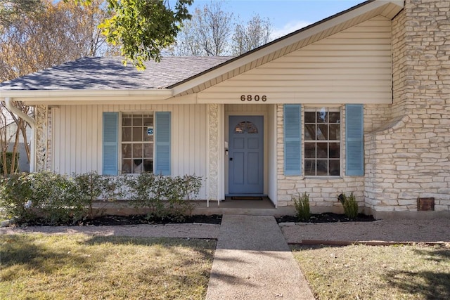 entrance to property with a porch