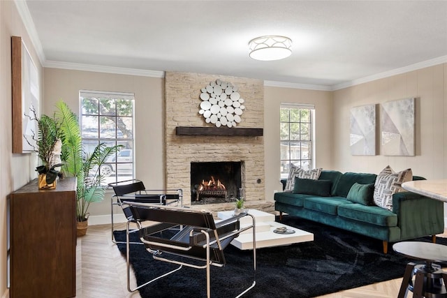 living room featuring parquet floors, ornamental molding, and a healthy amount of sunlight