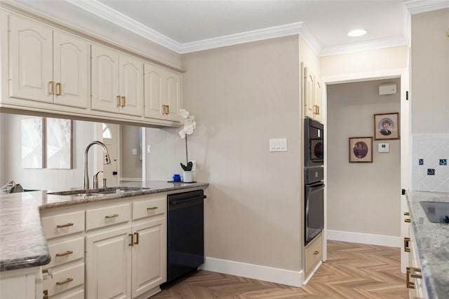 kitchen featuring sink, light stone counters, crown molding, light parquet flooring, and black appliances