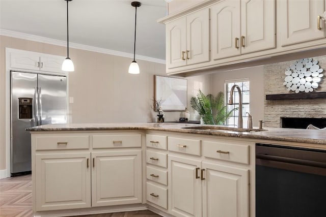 kitchen featuring stainless steel refrigerator with ice dispenser, sink, crown molding, black dishwasher, and pendant lighting