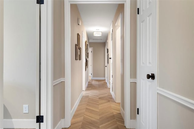 corridor featuring parquet floors