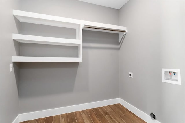 laundry area with washer hookup, hookup for an electric dryer, and hardwood / wood-style floors