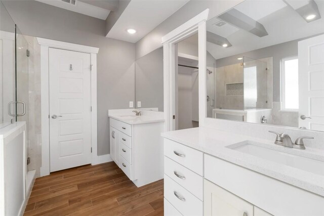 bathroom with vanity and an enclosed shower