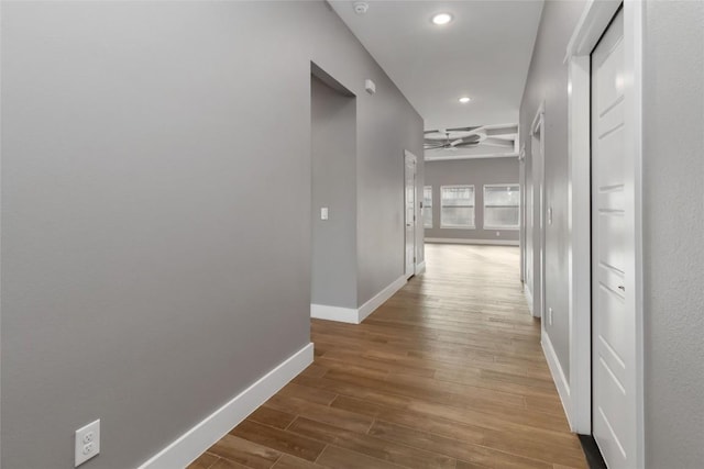 hallway featuring hardwood / wood-style floors